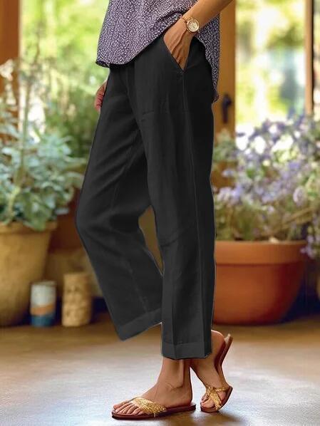 Black straight leg trousers